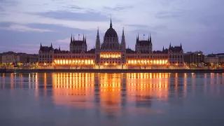 Photo of the Parliament building in Budapest at dusk