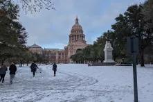  The hill leading to the Texas Capitol where locals are playing in the unusual snow.