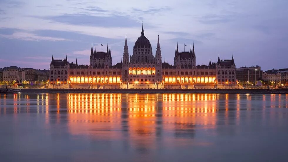 Photo of the Parliament building in Budapest at dusk