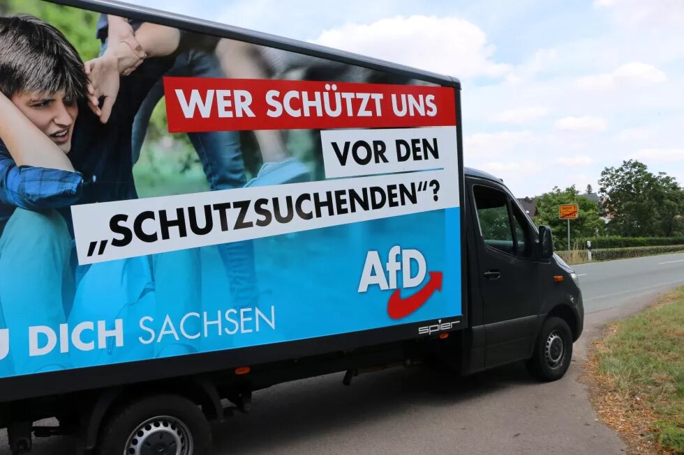 AfD mobile election poster 2019: WHO PROTECTS US FROM THE 'PROTECTION SEEKERS'