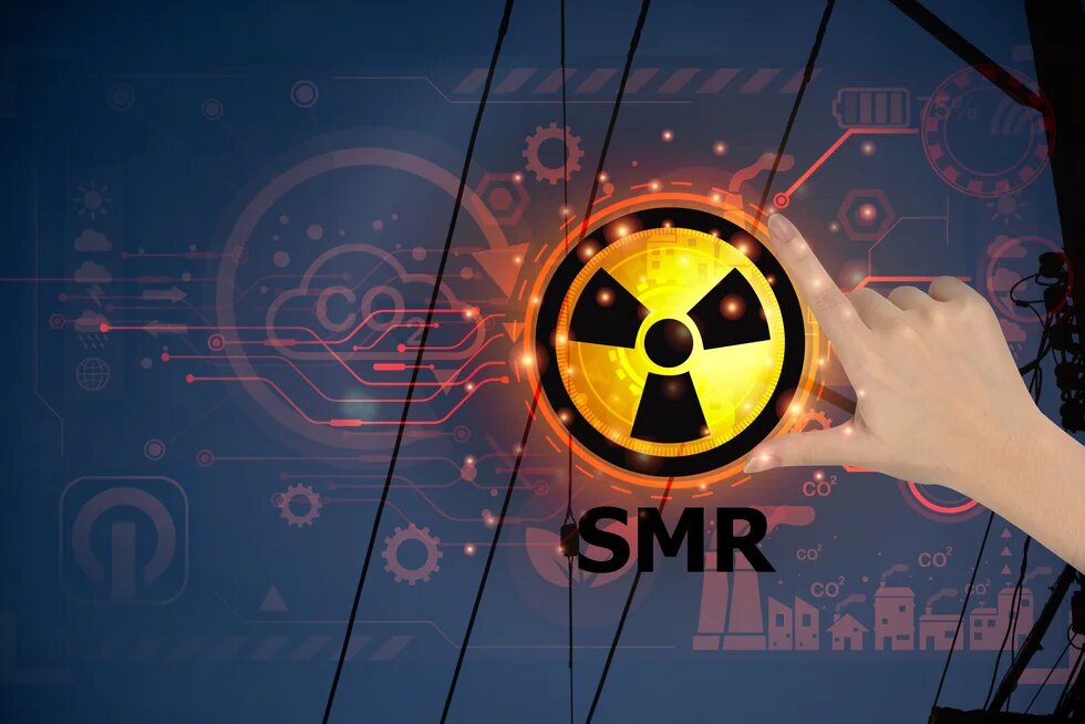 znak radioaktivity a ženská ruka