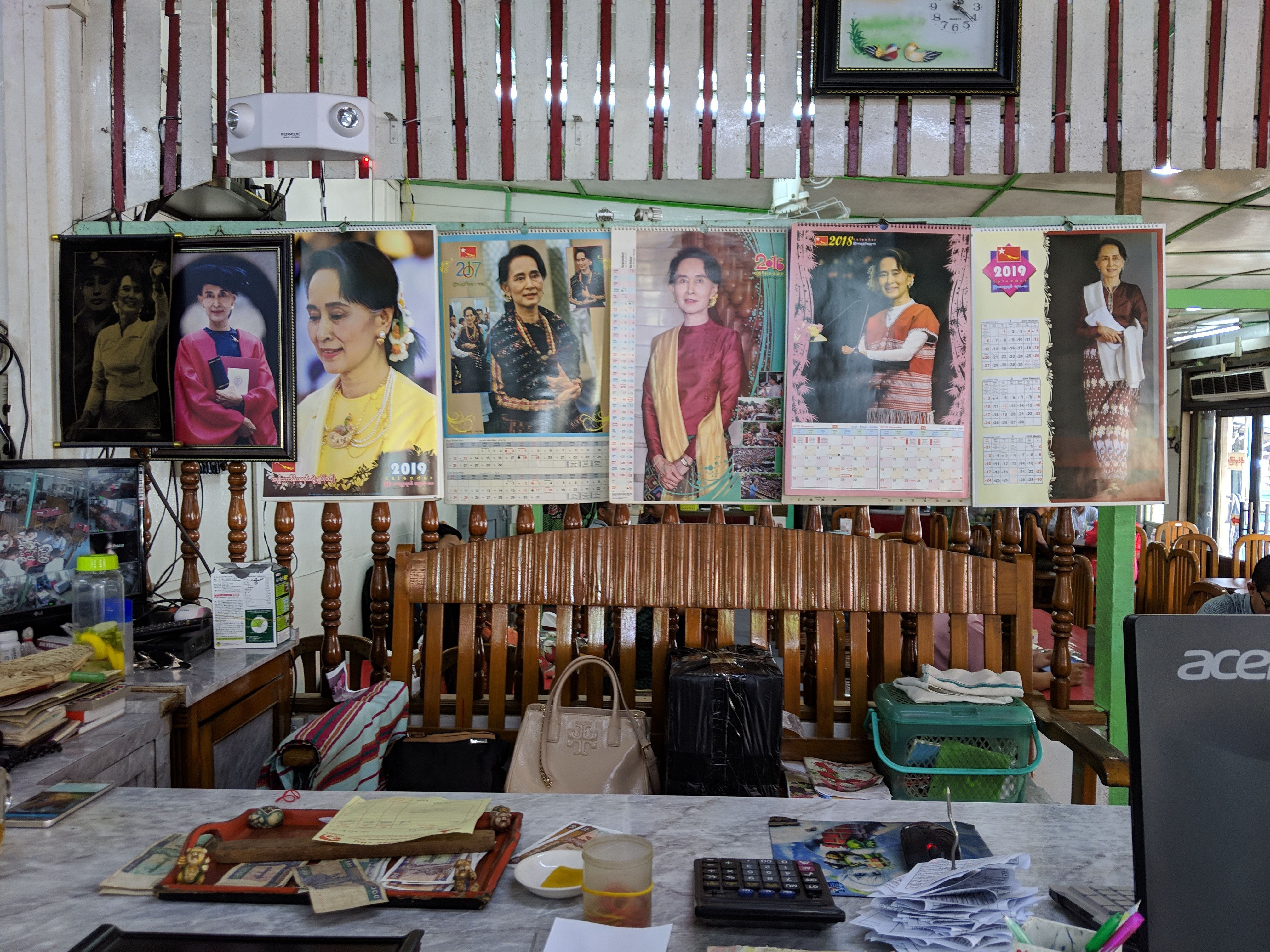 Despite international condemnation for her inaction on the Rohingya issue, veneration for Aung San Suu Kyi remains strong in Myanmar Cashier counter of a restaurant along Insein Road, Yangon